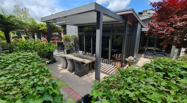 Executive Living Paradise - Furnished - Photo 1