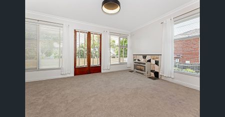 SPACIOUS 1950'S CHARM WITH SUNLIT LIVING & TIMLESS APPEAL - Photo 2