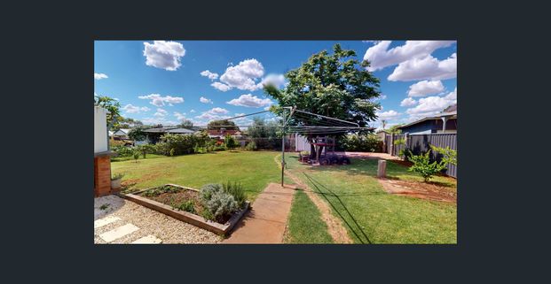 TIDY 3-BEDROOM COTTAGE BESIDE GOLF COURSE! - Photo 1