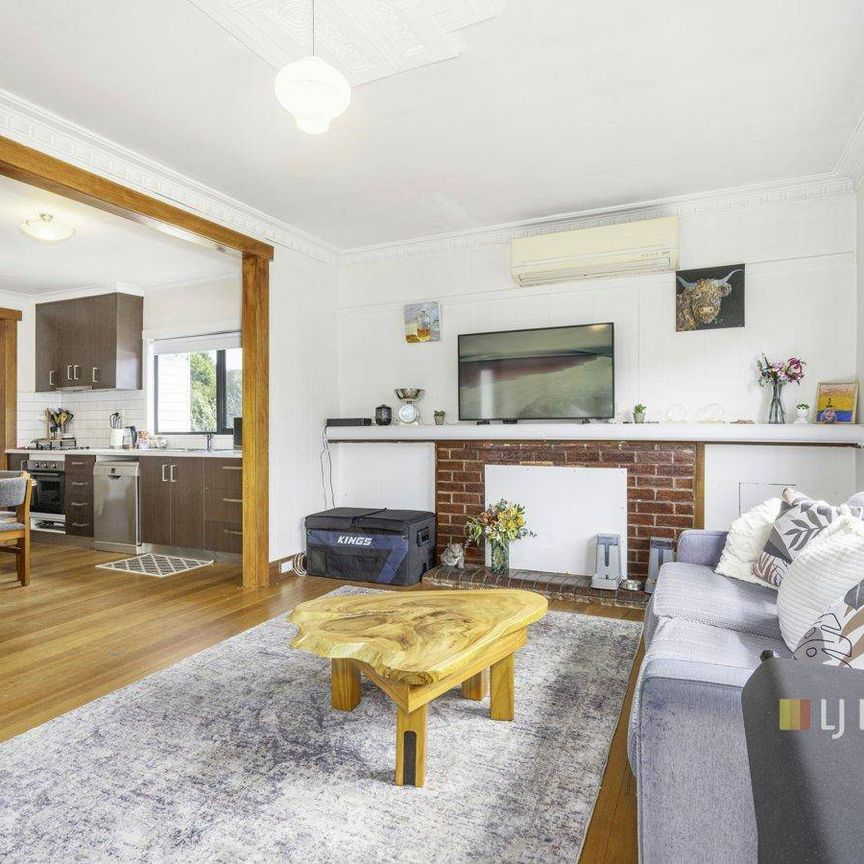 Comfortable Home in Convenient Quoiba Location - Photo 1