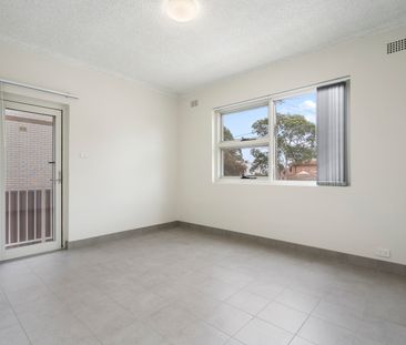 RENOVATED 2 BEDROOM UNITS WITH CAR SPACE - Photo 6