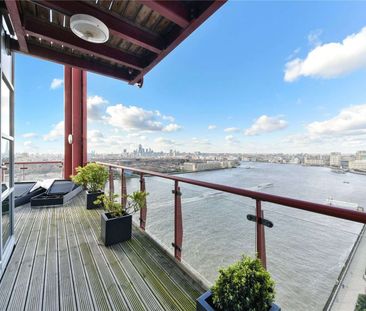 Offering panoramic views across the London skyline, is this exceptional 17th floor penthouse apartment which is conveniently located for Canary Wharf. - Photo 1