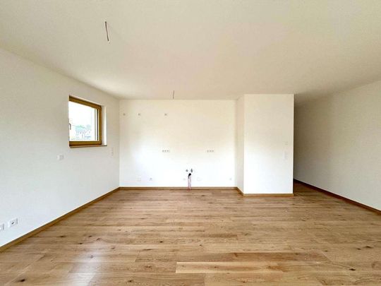 Barrierefreie 3-Zimmer-Wohnung mit Gartenanteil Inkl. Einbauküche am Cospudener See - Photo 1