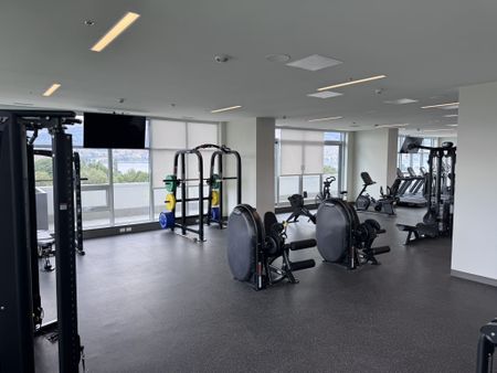 Luxury 3 Bed + Den Condo at Water Street by the Park - Photo 4