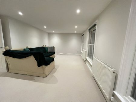 2 bedroom first floor maisonette with private patio and parking, on the High Street. - Photo 2