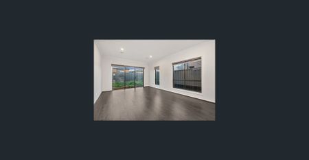 Spacious 4-Bedroom Family Home in a Prime Location! - Photo 2