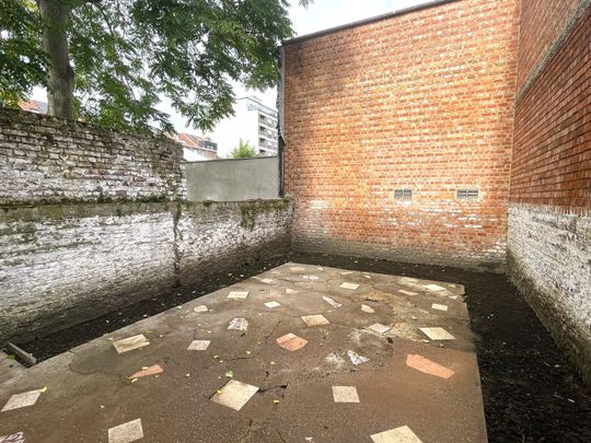 Lichtrijk appartement met 1 kamer en buitenterras op een zeer gunstige ligging! - Foto 1