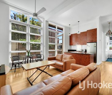 Experience the vibrant city lifestyle in this fully furnished groun... - Photo 1