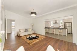 3BR Sun-catcher with great family living areas - Photo 1