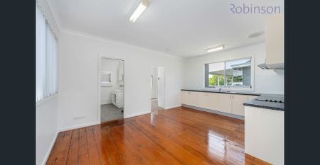 Freshly painted three bedroom home with air-conditioned living space and off street parking. - Photo 5
