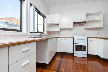 Neat Three Bedroom Home in Ideal Location - Photo 3