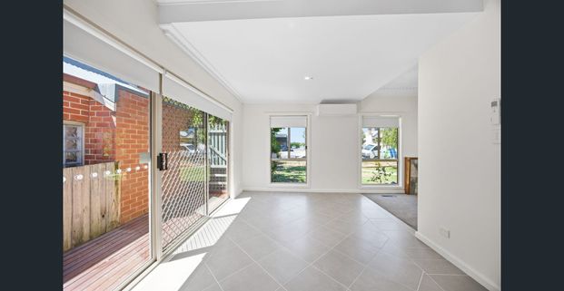 Beautifully refreshed throughout with brand new finishes and thoughtful updates - Photo 1