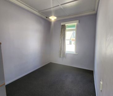 Tidy 3-Bedroom Home Close to Town - Photo 2