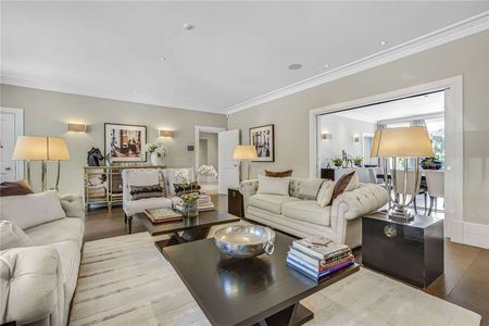 An exquisitely designed and finished double fronted detached house on an impressive plot and affording excellent lateral space and facilities, including a stunning indoor pool, gym and A/C. - Photo 3