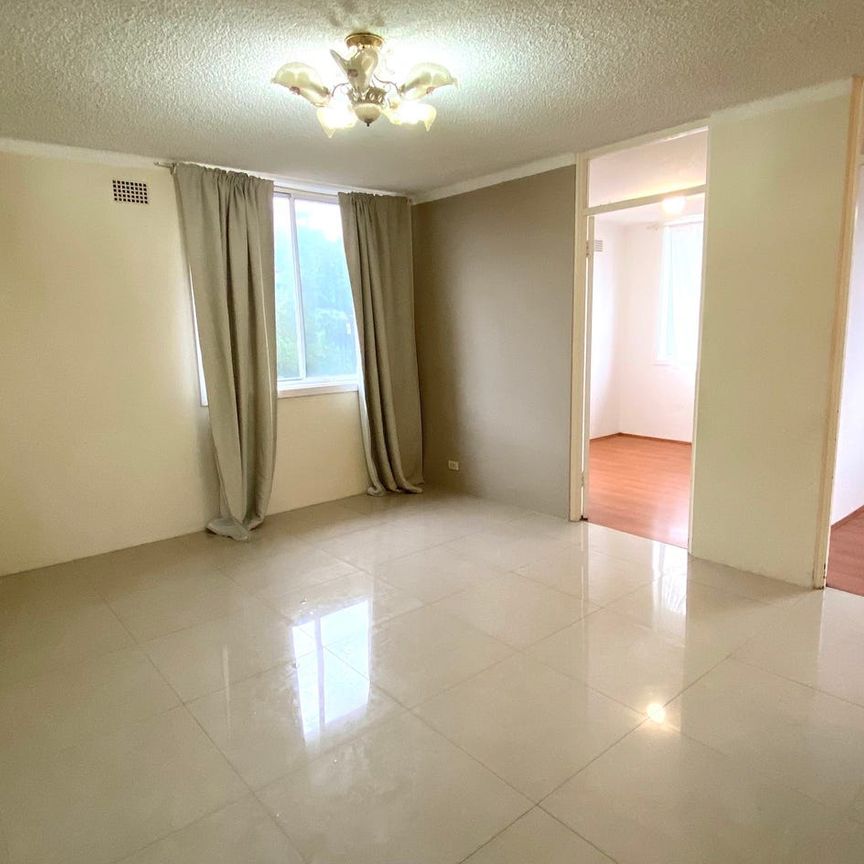 FANTASTIC TOP FLOOR UNIT 500M TO AUBURN STATION - Photo 1