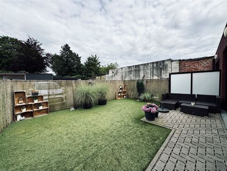 Gelijkvloers appartement met onderhoudsvriendelijke tuin - Foto 4