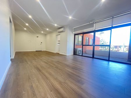 BRIGHT RENOVATED 2 BEDROOM TOP FLOOR UNIT - Photo 2