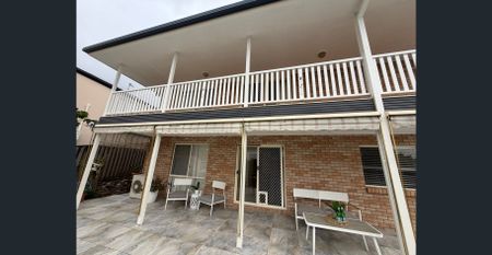 Discover this stunning family home for lease in the highly sought-after location of Pacific Pines. - Photo 4