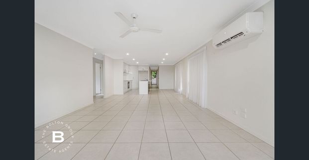 Stylish Lowset Home with Elevated Views in Springfield Lakes - Photo 1