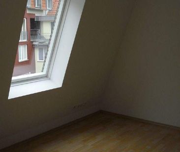 Gemütliche Dachgeschosswohnung im Damenviertel mit Balkon - Photo 1