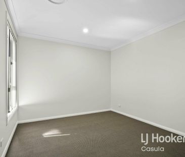 Modern 4-Bedroom Family Home - Photo 1