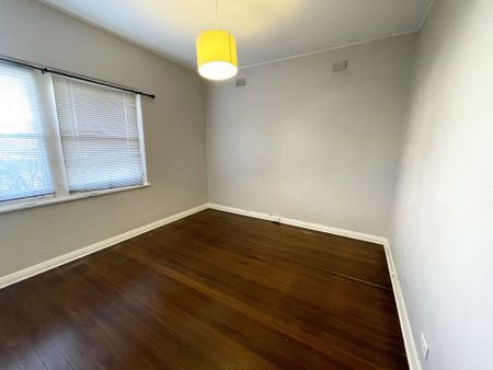 Large two bedroom ground floor unit with single garage - Photo 3