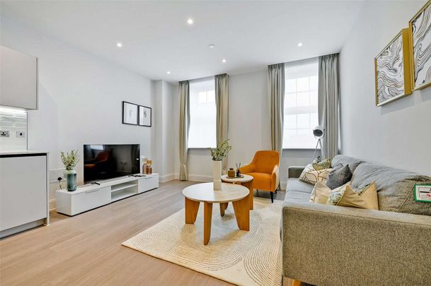 A stylish and fully-furnished two bedroom apartment with car parking in The Factory building at The Horlicks Quarter. - Photo 1