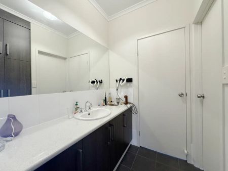 “Three bedroom entertainer with two living areas in perfect location!” - Photo 2