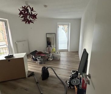 Die angebotene Mietwohnung befindet sich im Erdgeschoss eines gepfl... - Foto 1