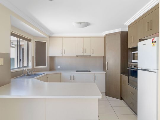 IMMACULATE THREE-BEDROOM HOME - Photo 1