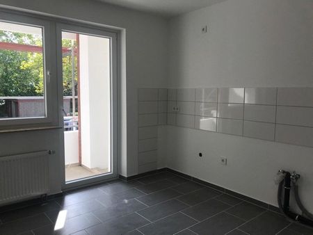 Modernisierte 3-Zimmer-Wohnung mit Balkon - Foto 5