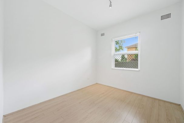 Modern & Convenient Living in a Boutique Block - Photo 1