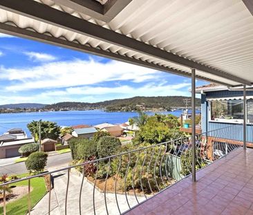 ENVIABLE LOCATION WITH WATERVIEWS! - Photo 2