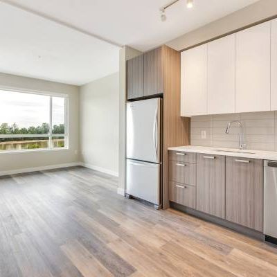 2 Bed + 2 Bath + Den available + 1-Year Free Parking! @ River District - Photo 1