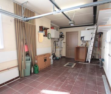 Verzorgde rijwoning met garage en tuin - Foto 5