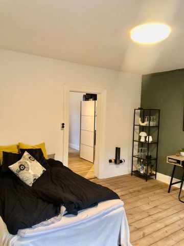 Hyggelig 2-værelses lejlighed med dejlig gårdhave - Photo 2