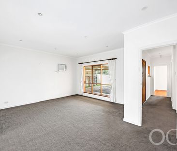 Open the Door to a Freshly Updated Home in a Prime Location - Photo 2