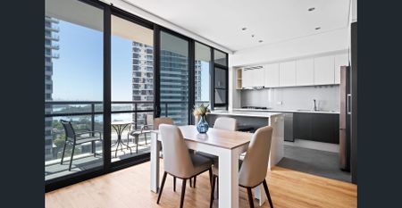 Furnished Residence | Floorboards throughout | Large balcony with water views - Photo 3