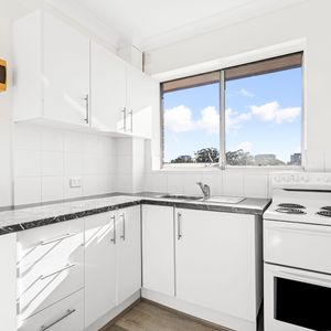 Sophisticated and Stylish Two Bedroom Apartment with Parking - Photo 2