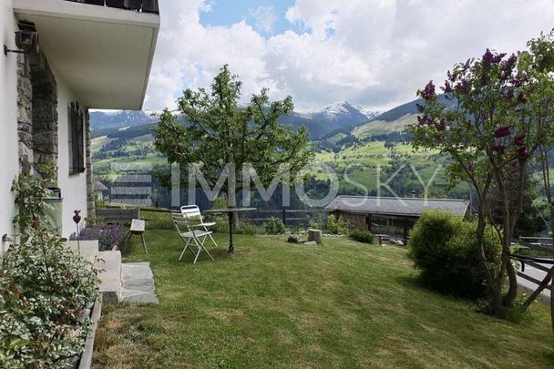 Cozy living paradise with fantastic mountain views - Photo 1