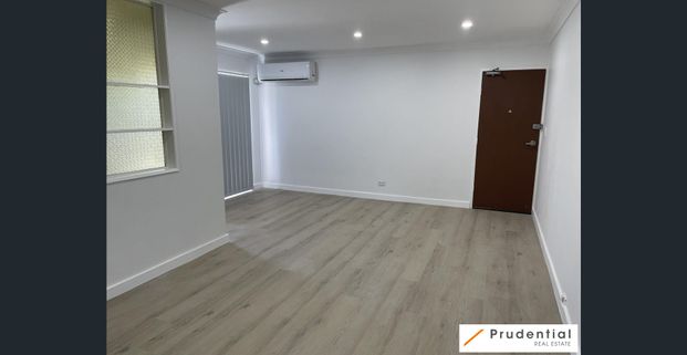 CENTRAL LOCATION UNIT FOR LEASE - WALK TO EVERYTHING - Photo 1