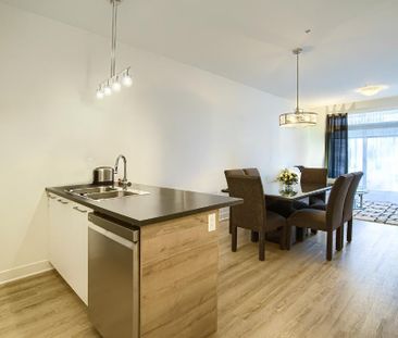 Condo locatif au cœur du Parc de La Cité-St-Hubert 3 ½, 762 pi² au ... - Photo 1