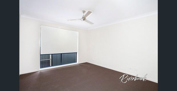 Four-Bedroom Home in a Welcoming Location - Photo 1