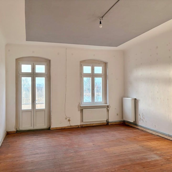 Charmante Wohnung mit Balkon und Wannenbad zum selbst renovieren - Foto 1