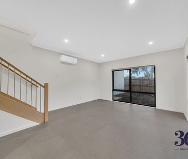 Stylish 3-Bedroom Townhouse with Modern Comforts & Thoughtful Design - Photo 1