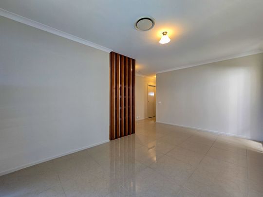 Modern, Spacious, and Perfectly Positioned - Photo 1