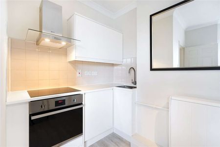 A contemporary studio apartment available to rent close to local amenities. The property is recently refurbished and located on the third floor of this mansion block. - Photo 2