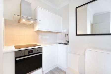 A contemporary studio apartment available to rent close to local amenities. The property is recently refurbished and located on the third floor of this mansion block. - Photo 3