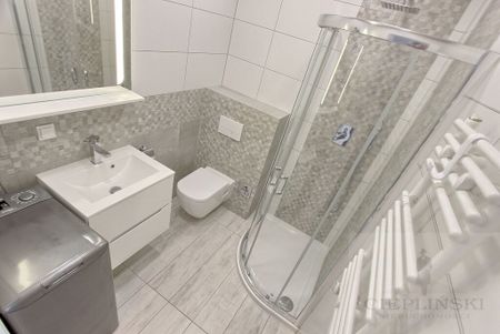 Idealne w apartamentowcu w centrum - Zdjęcie 2