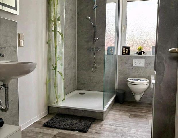 Sanierte 3-4 Zimmer Wohnung mit Einbauküche - Foto 1